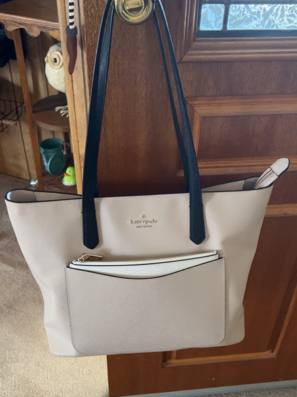 kate spade Cream Tote with Black Straps and Front Pocket